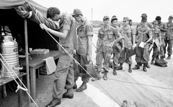 U.S. soldiers at Long Binh base in South Vietnam line up to give urine samples at a heroin detection center before departing for the United States. About 20 percent of soldiers said they were addicts, but most didn't continue drug use back home. U.S. soldiers at Long Binh base in South Vietnam line up to give urine samples at a heroin detection center before departing for the United States. About 20 percent of soldiers said they were addicts, but most didn't continue drug use back home.