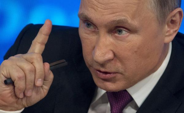 Russian President Vladimir Putin at his annual news conference in Moscow on Thursday, where he blamed Western sanctions and falling oil prices for his country's economic troubles. Russian President Vladimir Putin at his annual news conference in Moscow on Thursday, where he blamed Western sanctions and falling oil prices for his country's economic troubles.