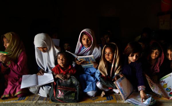 These Pakistani children go to a makeshift school in a clay house, located in a poor neighborhood on the outskirts of Islamabad. These Pakistani children go to a makeshift school in a clay house, located in a poor neighborhood on the outskirts of Islamabad.