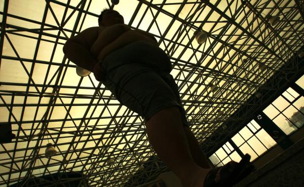 This Chinese teenager weighs 353 pounds. At a "slimming center" in China's central Hubei province, he's exercising and undergoing acupuncture to lose weight. This Chinese teenager weighs 353 pounds. At a "slimming center" in China's central Hubei province, he's exercising and undergoing acupuncture to lose weight.