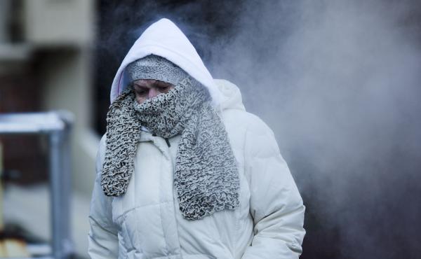 A commuter walks along Market Street in freezing temperatures on Tuesday in Philadelphia. A commuter walks along Market Street in freezing temperatures on Tuesday in Philadelphia.