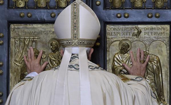 Pope Francis pushes open the Holy Door of St. Peter's Basilica, formally launching the Holy Year of Mercy, at the Vatican on Dec. 8. Pope Francis pushes open the Holy Door of St. Peter's Basilica, formally launching the Holy Year of Mercy, at the Vatican on Dec. 8.