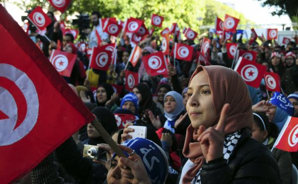 Tunisians celebrate the fifth anniversary of the Arab Spring on Thursday in Tunis. Tunisians celebrate the fifth anniversary of the Arab Spring on Thursday in Tunis.