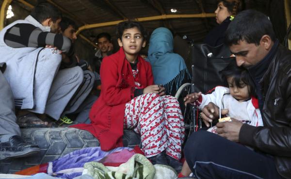 Civilians are loaded in a truck to be taken to safe places Thursday as Iraqi security forces clear the Soufiya neighborhood of Islamic State fighters in central Ramadi, 70 miles west of Baghdad, Iraq. Civilians are loaded in a truck to be taken to safe places Thursday as Iraqi security forces clear the Soufiya neighborhood of Islamic State fighters in central Ramadi, 70 miles west of Baghdad, Iraq.