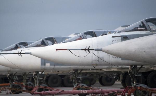 Russian bombers parked at Hmeimim air base in Syria on March 4. Since the cease-fire began in late February, the warplanes have mostly stayed on the ground. Russian bombers parked at Hmeimim air base in Syria on March 4. Since the cease-fire began in late February, the warplanes have mostly stayed on the ground.