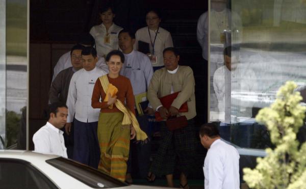 Myanmar Foreign Minister Aung San Suu Kyi (center) walks out of her ministry in Naypyitaw on Friday. Her ally U Htin Kyaw took over as Myanmar's president Wednesday. Myanmar Foreign Minister Aung San Suu Kyi (center) walks out of her ministry in Naypyitaw on Friday. Her ally U Htin Kyaw took over as Myanmar's president Wednesday.