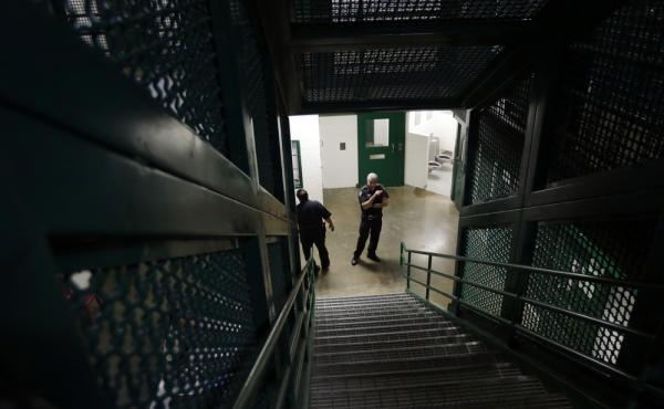 Guards watch over a single cell area in an acute unit of the mental heath unit at the Harris County Jail in Houston in 2014. Guards watch over a single cell area in an acute unit of the mental heath unit at the Harris County Jail in Houston in 2014.