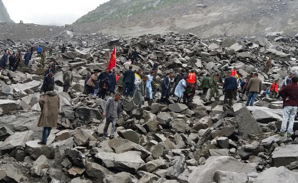 Chinese military police and rescue workers at the site of a landslide in in Xinmo village, Sichuan province on Saturday. Chinese military police and rescue workers at the site of a landslide in in Xinmo village, Sichuan province on Saturday.