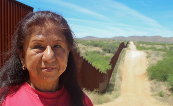 Maria Ochoa poses by the Arizona-Mexico border wall, south of Tucson, Ariz. Maria Ochoa poses by the Arizona-Mexico border wall, south of Tucson, Ariz.