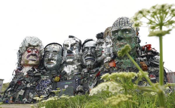 A sculpture created out of electronic waste in the likeness of Mount Rushmore and the G-7 leaders sits on a hill in Cornwall, England, near where the leaders of the world's wealthiest nations will meet. A sculpture created out of electronic waste in the likeness of Mount Rushmore and the G-7 leaders sits on a hill in Cornwall, England, near where the leaders of the world's wealthiest nations will meet.