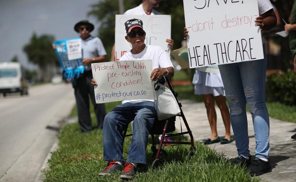 Shelton Allwood joined other demonstrators in Miami last year calling for continued protection for people who have pre-existing medical conditions. Shelton Allwood joined other demonstrators in Miami last year calling for continued protection for people who have pre-existing medical conditions.