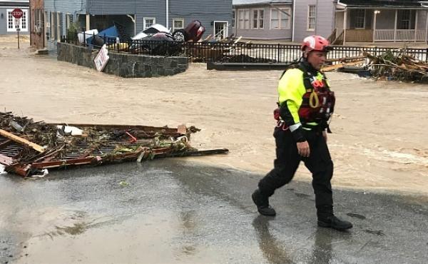 Floods in Ellicott City, Maryland, pushed cars into a pile last May. This year has been a year of record rainfall for cities throughout the mid-Atlantic and Carolinas. Floods in Ellicott City, Maryland, pushed cars into a pile last May. This year has been a year of record rainfall for cities throughout the mid-Atlantic and Carolinas.