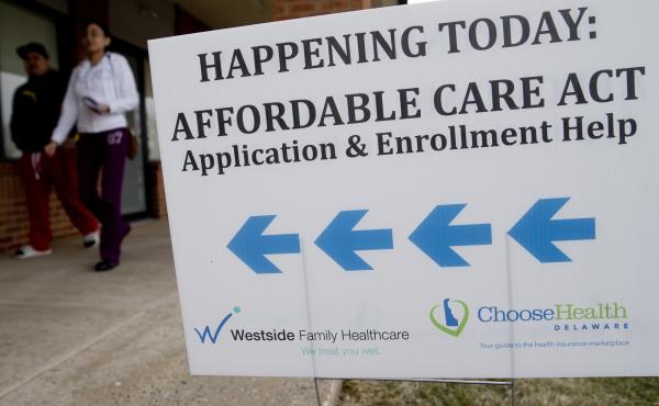 Enrollment help was plentiful for insurance sign-ups in the early years of the Affordable Care Act, such as at this clinic in Bear, Del., in 2014. Though the Trump administration has since slashed the outreach budget, about 930,000 people have signed up f Enrollment help was plentiful for insurance sign-ups in the early years of the Affordable Care Act, such as at this clinic in Bear, Del., in 2014. Though the Trump administration has since slashed the outreach budget, about 930,000 people have signed up f