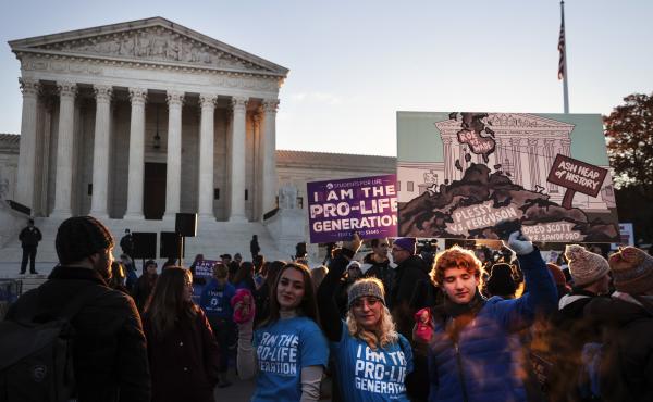 Activists and demonstrators gather in front of the U.S. Supreme Court as the justices hear arguments in Dobbs v. Jackson Women's Health. Activists and demonstrators gather in front of the U.S. Supreme Court as the justices hear arguments in Dobbs v. Jackson Women's Health.