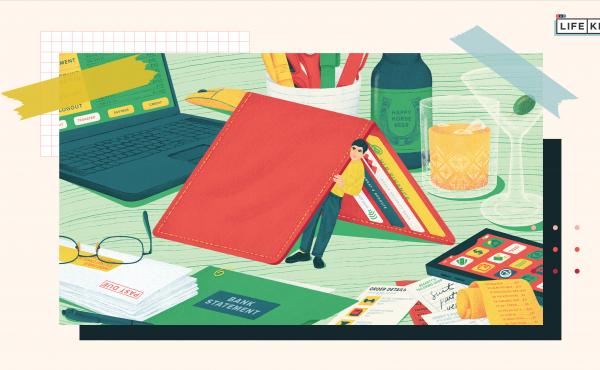 Illustration of a person in miniature hiding underneath a tented wallet on a desk, peering out to a tablescape of bills, finance apps, a laptop, receipts and a few drinks, symbolizing hiding from money problems. Illustration of a person in miniature hiding underneath a tented wallet on a desk, peering out to a tablescape of bills, finance apps, a laptop, receipts and a few drinks, symbolizing hiding from money problems.