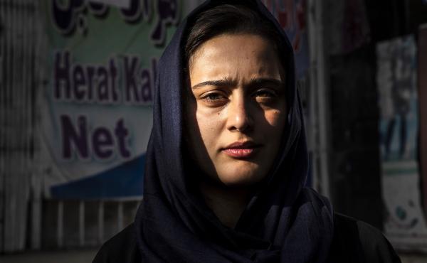 Dawlatt Naimati, 22, from Kunduz, stands outside an internet café where she is seeking help applying for a U.S. special immigrant visa on Aug. 8, in Kabul, Afghanistan. Dawlatt Naimati, 22, from Kunduz, stands outside an internet café where she is seeking help applying for a U.S. special immigrant visa on Aug. 8, in Kabul, Afghanistan.