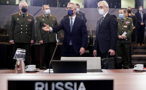 NATO Secretary-General Jens Stoltenberg (center) and Russia's Deputy Foreign Minister Alexander Grushko arrive for the NATO-Russia Council at NATO headquarters, in Brussels, Wednesday. Senior NATO and Russian officials met to try to bridge differences ove NATO Secretary-General Jens Stoltenberg (center) and Russia's Deputy Foreign Minister Alexander Grushko arrive for the NATO-Russia Council at NATO headquarters, in Brussels, Wednesday. Senior NATO and Russian officials met to try to bridge differences ove
