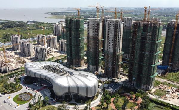 The halted under-construction Evergrande Cultural Tourism City, a mixed-used residential, retail and entertainment development in Taicang in China's eastern Jiangsu province. The halted under-construction Evergrande Cultural Tourism City, a mixed-used residential, retail and entertainment development in Taicang in China's eastern Jiangsu province.