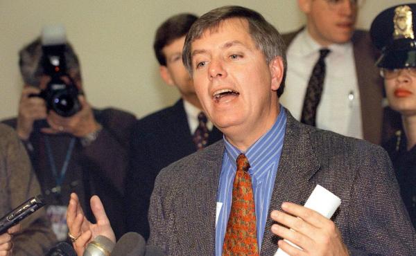 Graham speaks to reporters in December 1998 about the impeachment trial against President Bill Clinton. Graham speaks to reporters in December 1998 about the impeachment trial against President Bill Clinton.