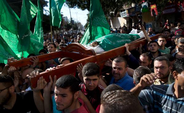 Palestinians carry the body of Mousab Abu Leila, 29, at his funeral after he was killed along the Gaza border during a protest against the U.S. move of its embassy to Jerusalem. Palestinians carry the body of Mousab Abu Leila, 29, at his funeral after he was killed along the Gaza border during a protest against the U.S. move of its embassy to Jerusalem.