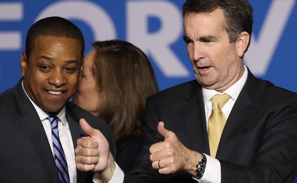 Virginia Gov.-elect Ralph Northam (right) and Lt. Gov.-elect Justin Fairfax greet supporters at an election night rally Tuesday after the Democrats' victory. Virginia Gov.-elect Ralph Northam (right) and Lt. Gov.-elect Justin Fairfax greet supporters at an election night rally Tuesday after the Democrats' victory.