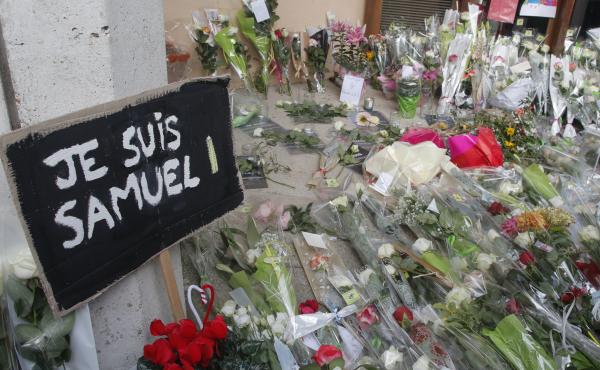 Authorities in France say they've detained nine people in connection with the decapitation of a history teacher in a Paris suburb on Friday. The teacher had shown caricatures of the Prophet Muhammad to his class, authorities said. Authorities in France say they've detained nine people in connection with the decapitation of a history teacher in a Paris suburb on Friday. The teacher had shown caricatures of the Prophet Muhammad to his class, authorities said.