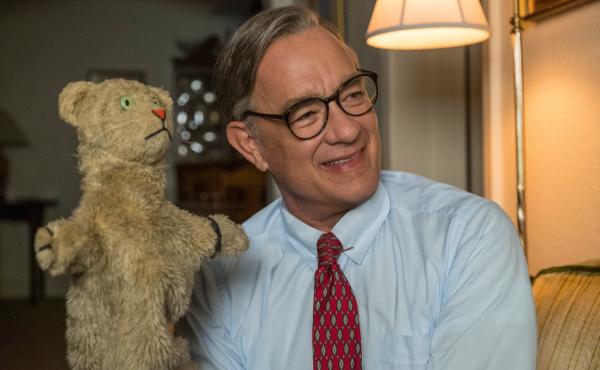 Tom Hanks stars as the beloved children's performer Fred Rogers in A Beautiful Day in the Neighborhood. Tom Hanks stars as the beloved children's performer Fred Rogers in A Beautiful Day in the Neighborhood.