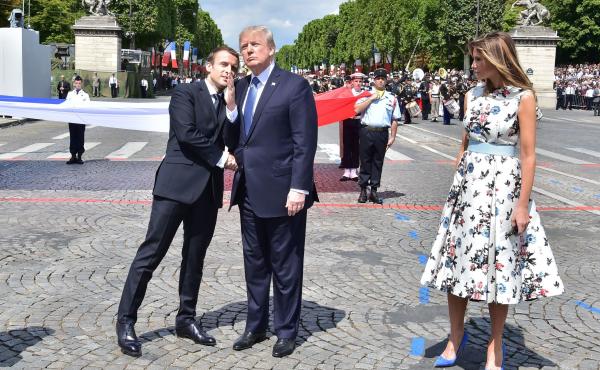 French President Emmanuel Macron (left) shakes hands with President Trump, next to first lady Melania Trump, during the annual Bastille Day military parade in Paris on July 14, 2017. Trump is hosting Macron in Washington this week for the first official s French President Emmanuel Macron (left) shakes hands with President Trump, next to first lady Melania Trump, during the annual Bastille Day military parade in Paris on July 14, 2017. Trump is hosting Macron in Washington this week for the first official s