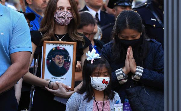 Family members and loved ones of victims of those who died on 9/11 attend the 20th anniversary commemoration ceremony on Saturday at the National September 11 Memorial & Museum in New York City. Family members and loved ones of victims of those who died on 9/11 attend the 20th anniversary commemoration ceremony on Saturday at the National September 11 Memorial & Museum in New York City.