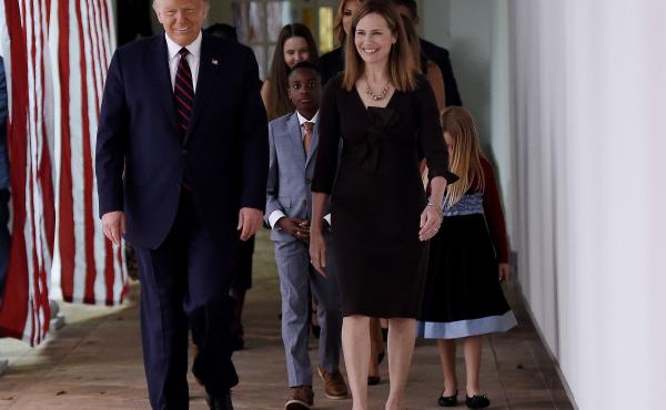 President Trump and Judge Amy Coney Barrett walk to the Rose Garden of the White House on Saturday. President Trump and Judge Amy Coney Barrett walk to the Rose Garden of the White House on Saturday.