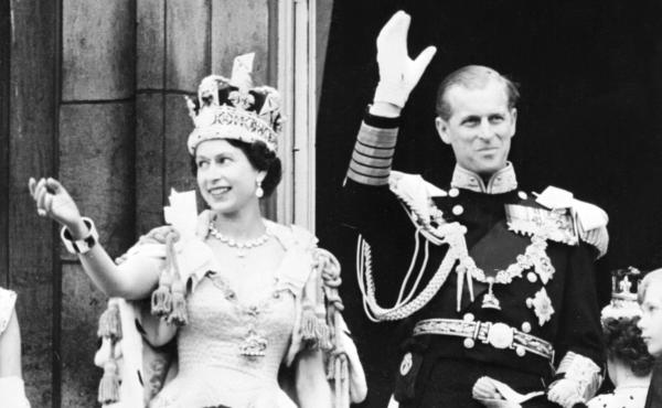 Queen Elizabeth II and Prince Philip wave to the crowd after her coronation at Westminster Abbey in London on June 2, 1953. Queen Elizabeth II and Prince Philip wave to the crowd after her coronation at Westminster Abbey in London on June 2, 1953.