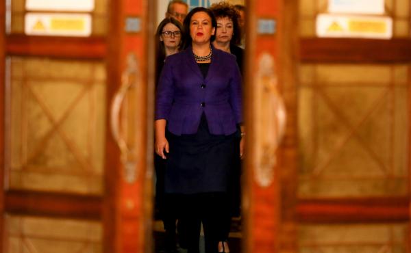 Sinn Fein president Mary Lou McDonald arrives to speak to the media at the Parliament Buildings in Belfast on Feb. 12. She supports same-sex marriage and ending Ireland's abortion ban, but critics warn that she's tied to many of her party's hard-line poli Sinn Fein president Mary Lou McDonald arrives to speak to the media at the Parliament Buildings in Belfast on Feb. 12. She supports same-sex marriage and ending Ireland's abortion ban, but critics warn that she's tied to many of her party's hard-line poli