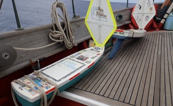 The Rye Riptides pictured on board the Corwith Cramer before launching in October 2020. Nearly 18 months later, the mini boat was retrieved from an uninhabited Norwegian island with its messages and gifts intact. The Rye Riptides pictured on board the Corwith Cramer before launching in October 2020. Nearly 18 months later, the mini boat was retrieved from an uninhabited Norwegian island with its messages and gifts intact.