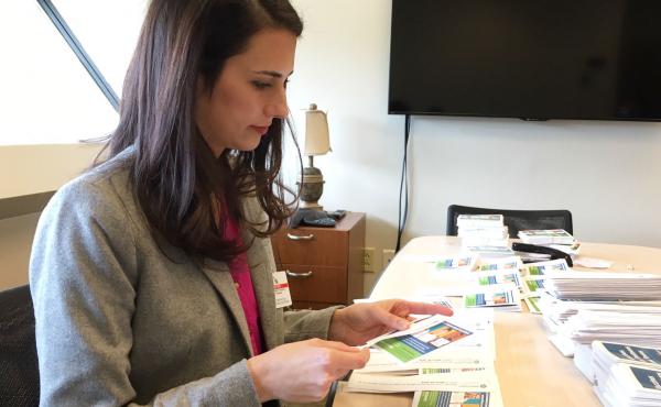 Thirty-three-year-old mother Kim Nelson started a vaccine advocacy group in Greenville, S.C., to help reach vaccine-hesitant families. Here, she prepares vaccine information flyers for public school students. Thirty-three-year-old mother Kim Nelson started a vaccine advocacy group in Greenville, S.C., to help reach vaccine-hesitant families. Here, she prepares vaccine information flyers for public school students.