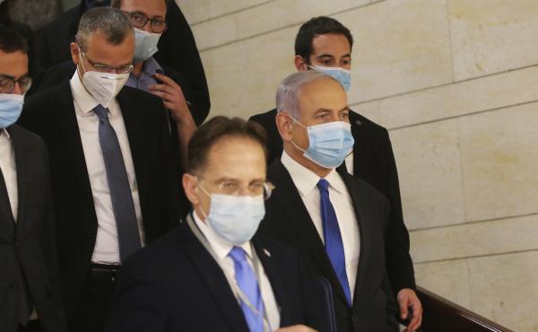 Israeli Prime Minister Benjamin Netanyahu makes his way to attend the swearing-in ceremony of his new government at the Knesset, Israel's parliament, on Sunday. Israeli Prime Minister Benjamin Netanyahu makes his way to attend the swearing-in ceremony of his new government at the Knesset, Israel's parliament, on Sunday.