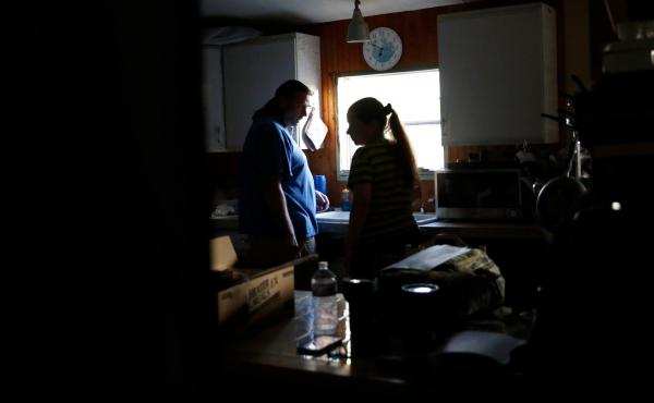 Nancy and Christian Schneider live in the Holly Lake Mobile Home park, where they haven't had electricity in their home since Hurricane Irma struck Florida over a week ago. Nancy and Christian Schneider live in the Holly Lake Mobile Home park, where they haven't had electricity in their home since Hurricane Irma struck Florida over a week ago.