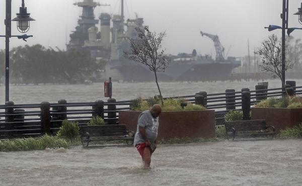 Downtown Wilmington, N.C., after Hurricane Florence made landfall in 2018. Storms like Florence, with both heavy rain and very high tides, are projected to get more common as the Earth gets hotter. Downtown Wilmington, N.C., after Hurricane Florence made landfall in 2018. Storms like Florence, with both heavy rain and very high tides, are projected to get more common as the Earth gets hotter.
