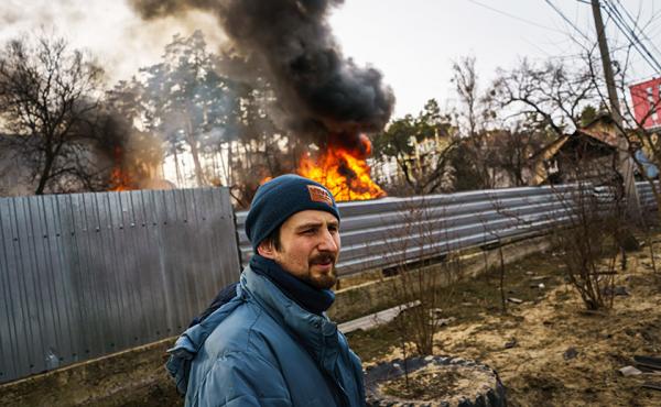 Maksim Chepchenko near a burning home in in Irpin, Ukraine, after Russian bombings on Saturday. Maksim Chepchenko near a burning home in in Irpin, Ukraine, after Russian bombings on Saturday.