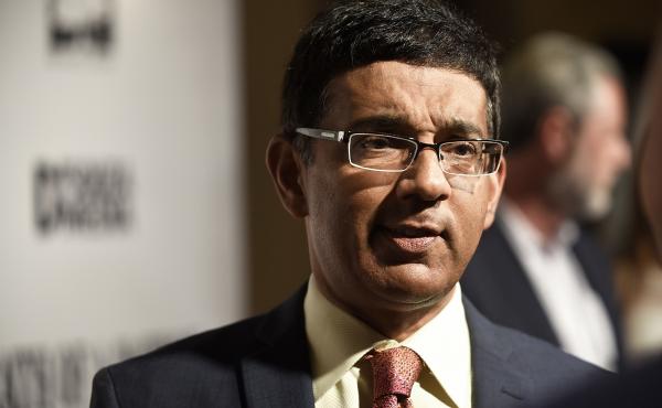 Dinesh D'Souza, seen here at a premiere of one of his films in 2018, has released a new film alleging voter fraud in the 2020 presidential election. Fact checkers have cast doubt on many of the film's claims. Dinesh D'Souza, seen here at a premiere of one of his films in 2018, has released a new film alleging voter fraud in the 2020 presidential election. Fact checkers have cast doubt on many of the film's claims.
