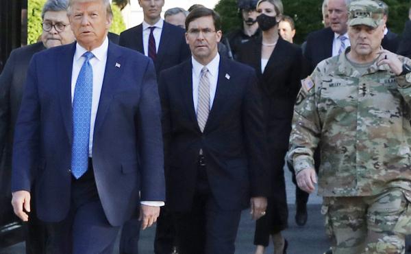 President Trump and his advisers, including Attorney General William Barr, walk through Lafayette Square on June 1 after it was cleared of protesters. Trump then posed for photos holding up a Bible in front of St. John's Episcopal Church. President Trump and his advisers, including Attorney General William Barr, walk through Lafayette Square on June 1 after it was cleared of protesters. Trump then posed for photos holding up a Bible in front of St. John's Episcopal Church.