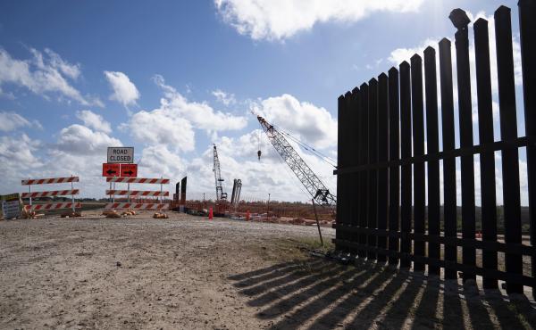 The existing border wall (right) is seen near the construction site of new wall panels south of Donna, Texas, on Nov. 20. There is widespread skepticism on the border that President Trump will get anywhere near the 450 miles of wall he wants by next Novem The existing border wall (right) is seen near the construction site of new wall panels south of Donna, Texas, on Nov. 20. There is widespread skepticism on the border that President Trump will get anywhere near the 450 miles of wall he wants by next Novem