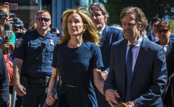 Actress Felicity Huffman and her husband, actor William H. Macy, arrive for her sentencing hearing Friday at the John Joseph Moakley United States Courthouse in Boston. Actress Felicity Huffman and her husband, actor William H. Macy, arrive for her sentencing hearing Friday at the John Joseph Moakley United States Courthouse in Boston.