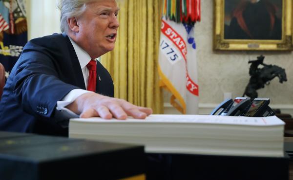 President Trump prepares to sign the tax legislation in the Oval Office on Dec. 22, 2017. The GOP tax cut did not pay for itself, as promised, nor did it deliver a sustained boost to economic growth. President Trump prepares to sign the tax legislation in the Oval Office on Dec. 22, 2017. The GOP tax cut did not pay for itself, as promised, nor did it deliver a sustained boost to economic growth.