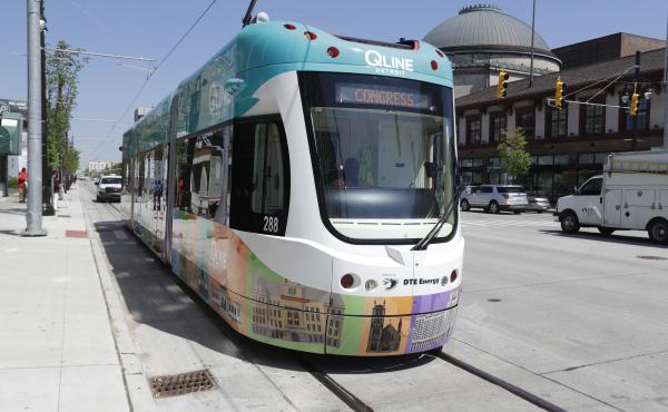 A streetcar rides along Woodward Avenue on Friday in Detroit — the city's first in 61 years. The QLine project was led by private businesses and philanthropic organizations in partnership with local, state and the federal government. A streetcar rides along Woodward Avenue on Friday in Detroit — the city's first in 61 years. The QLine project was led by private businesses and philanthropic organizations in partnership with local, state and the federal government.