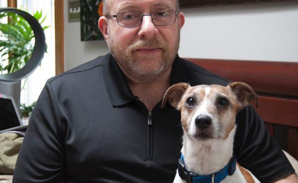 Phil Gutis with his dog, Abe, who died last year. Gutis, who has Alzheimer's, hoped an experimental drug could help preserve his memories. Phil Gutis with his dog, Abe, who died last year. Gutis, who has Alzheimer's, hoped an experimental drug could help preserve his memories.