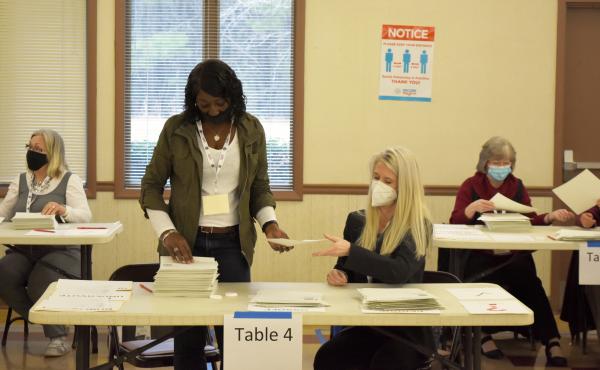 Bartow County, Ga. election workers conduct a full hand count of ballots in the Jan. 5 Senate runoff between former Sen. David Perdue and Sen.-elect Jon Ossoff as part of a voluntary recount aimed at improving voter confidence. Bartow County, Ga. election workers conduct a full hand count of ballots in the Jan. 5 Senate runoff between former Sen. David Perdue and Sen.-elect Jon Ossoff as part of a voluntary recount aimed at improving voter confidence.