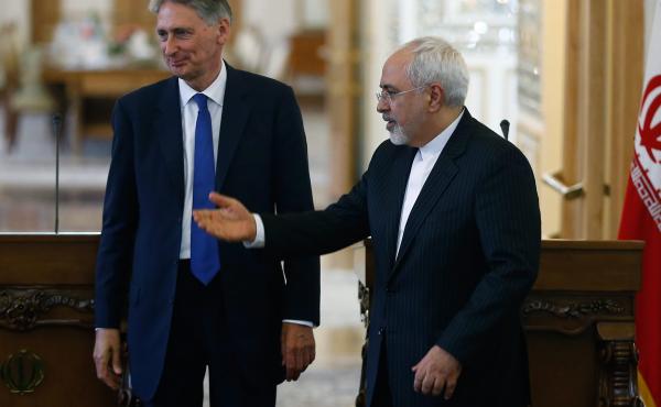 British Foreign Secretary Philip Hammond and Iranian Foreign Minister Mohammad Javad Zarif deliver a joint news conference following their meeting in Tehran, on Sunday, as the British embassy is reopened after being shuttered for nearly four years. British Foreign Secretary Philip Hammond and Iranian Foreign Minister Mohammad Javad Zarif deliver a joint news conference following their meeting in Tehran, on Sunday, as the British embassy is reopened after being shuttered for nearly four years.