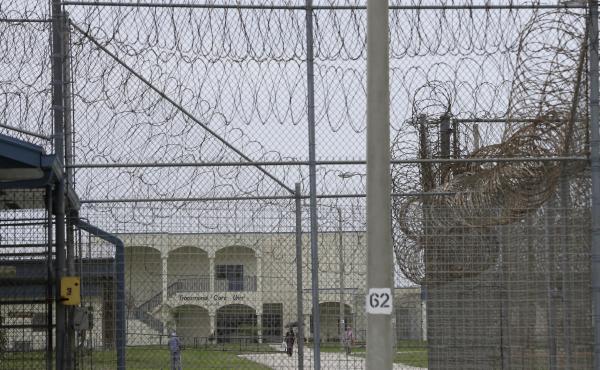 A prisoner works on the lawn at the Dade Correctional Institution In 2014, in Florida City, Fla. On Friday, Miami-Dade prosecutor Katherine Fernandez Rundle found no wrongdoing in the death of mentally ill prisoner Darren Rainey, who was locked in a showe A prisoner works on the lawn at the Dade Correctional Institution In 2014, in Florida City, Fla. On Friday, Miami-Dade prosecutor Katherine Fernandez Rundle found no wrongdoing in the death of mentally ill prisoner Darren Rainey, who was locked in a showe