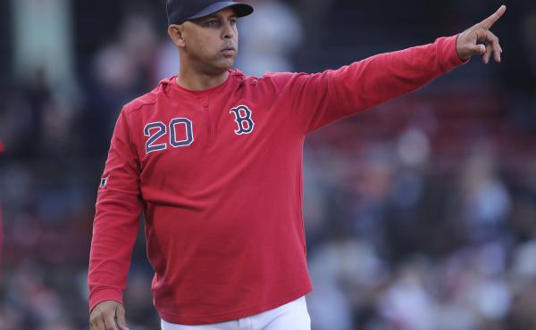 The Boston Red Sox have reportedly rehired Alex Cora as the team's manager. He is seen above as he gestures toward the outfield after a win over the San Francisco Giants in a game at Fenway Park in Boston in 2019. The Boston Red Sox have reportedly rehired Alex Cora as the team's manager. He is seen above as he gestures toward the outfield after a win over the San Francisco Giants in a game at Fenway Park in Boston in 2019.