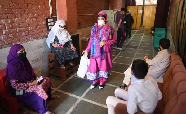 People wait to enter a bakery to shop for treats on Wednesday, ahead of Eid al-Fitr in Srinagar, India. People wait to enter a bakery to shop for treats on Wednesday, ahead of Eid al-Fitr in Srinagar, India.